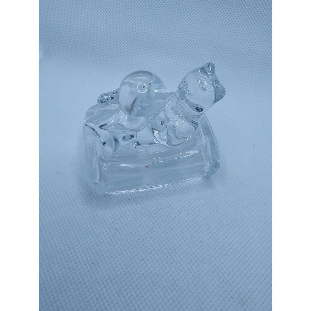 Avon Glass Cat playing with Ball
